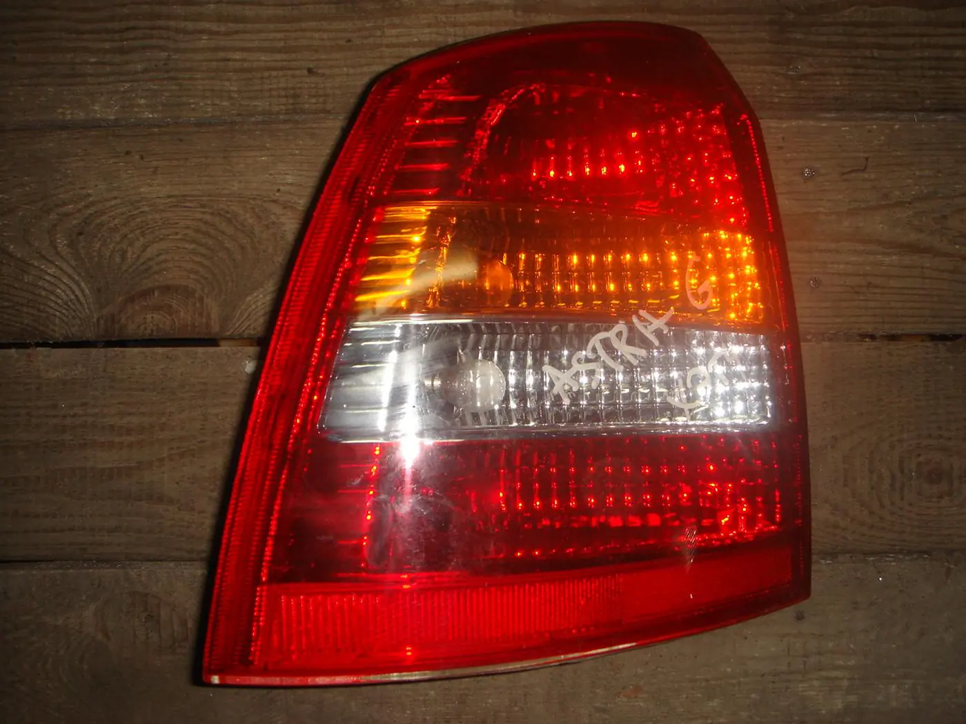 Фонарь задний левый к Opel Astra 2000