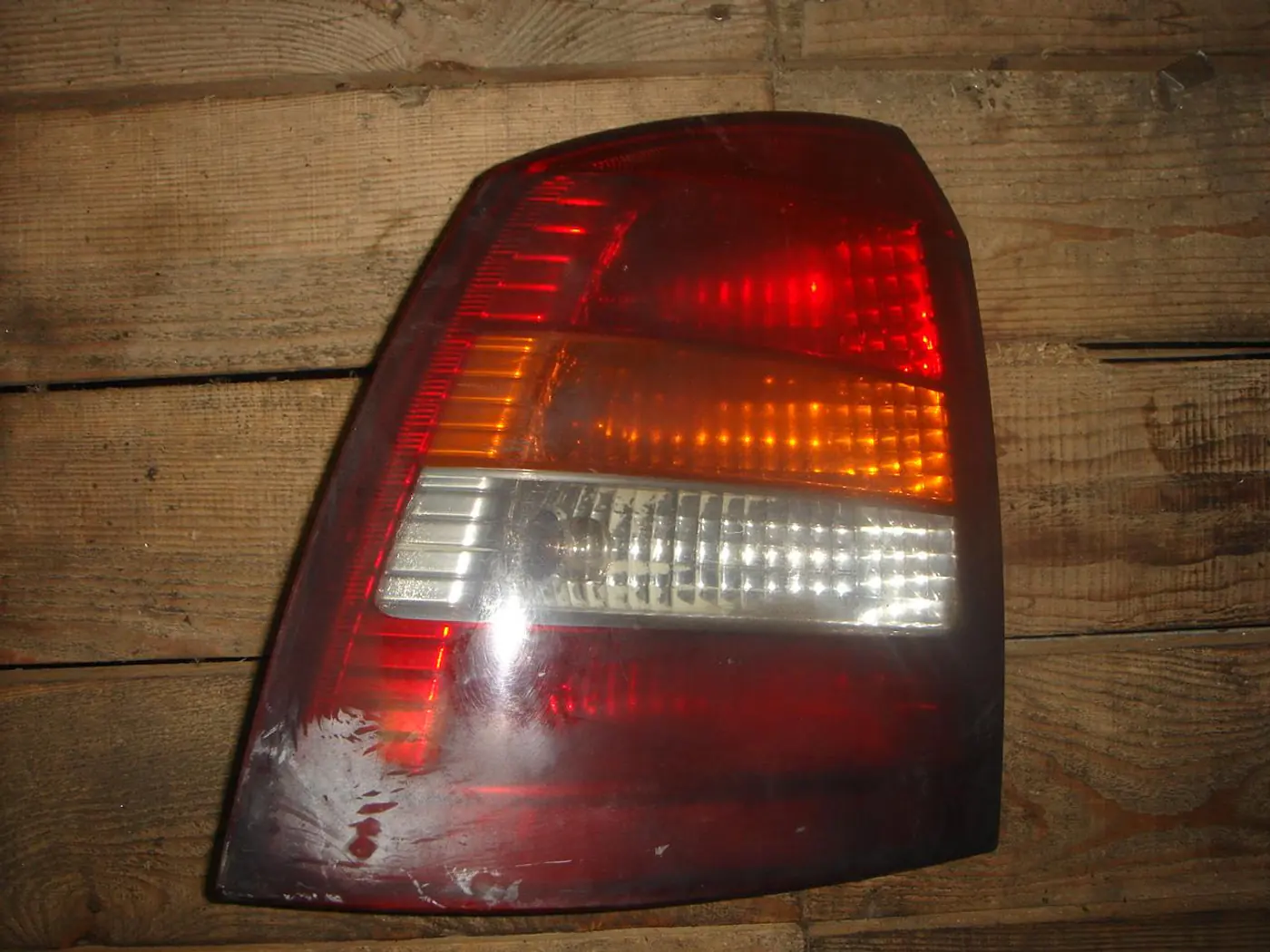 Фонарь задний левый к Opel Astra 2000