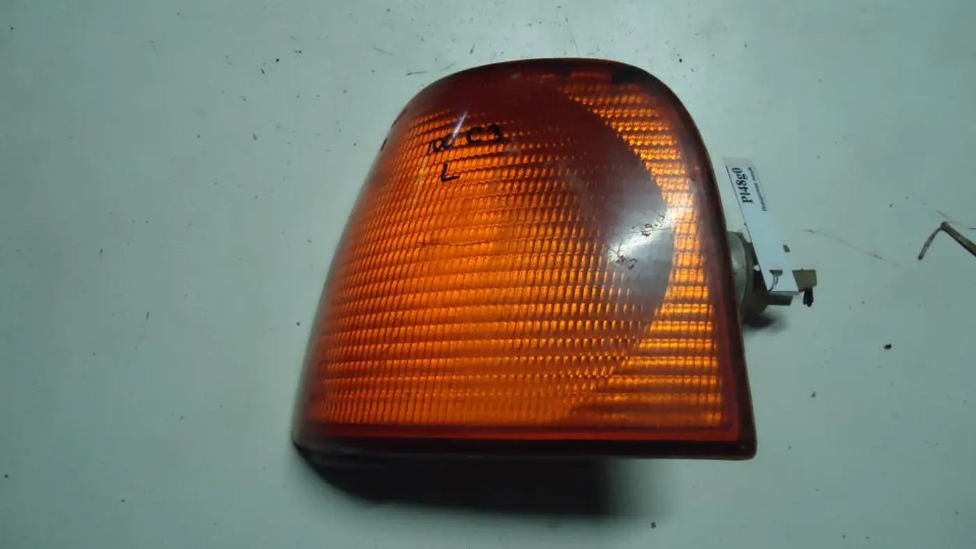 Поворотник левый к Audi 100 1988