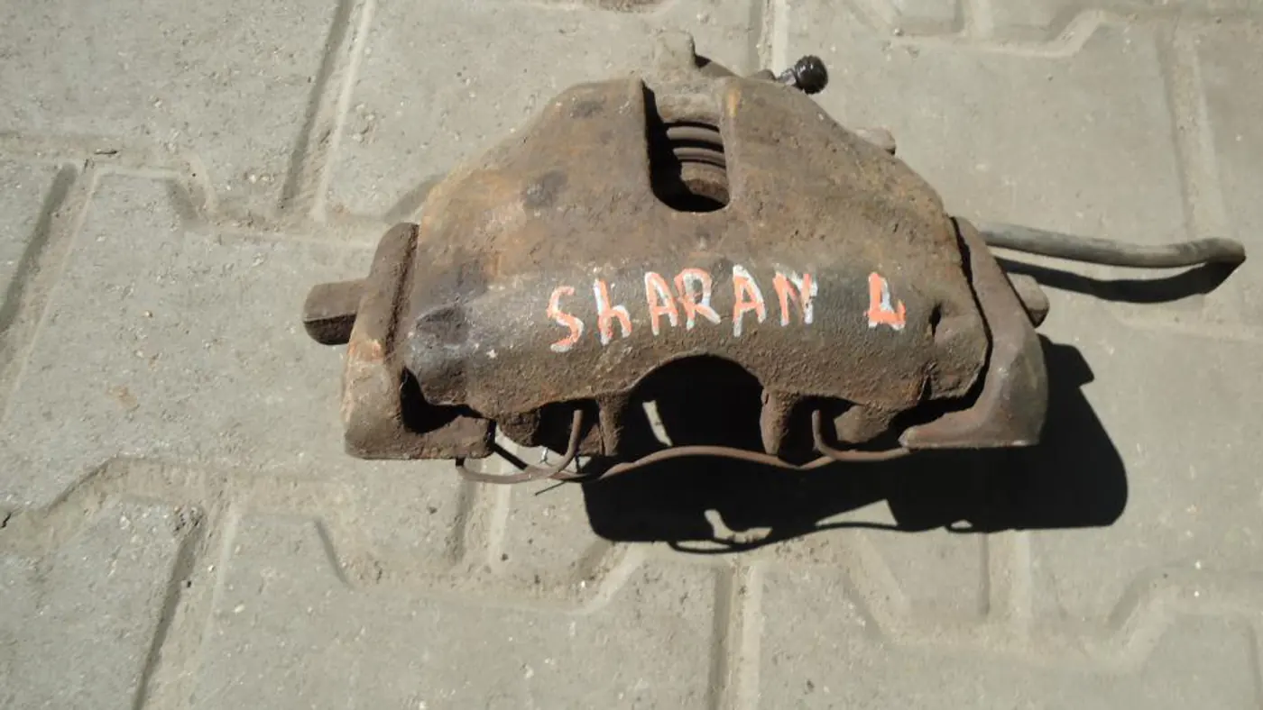 Суппорт передний левый к Volkswagen Sharan 1997