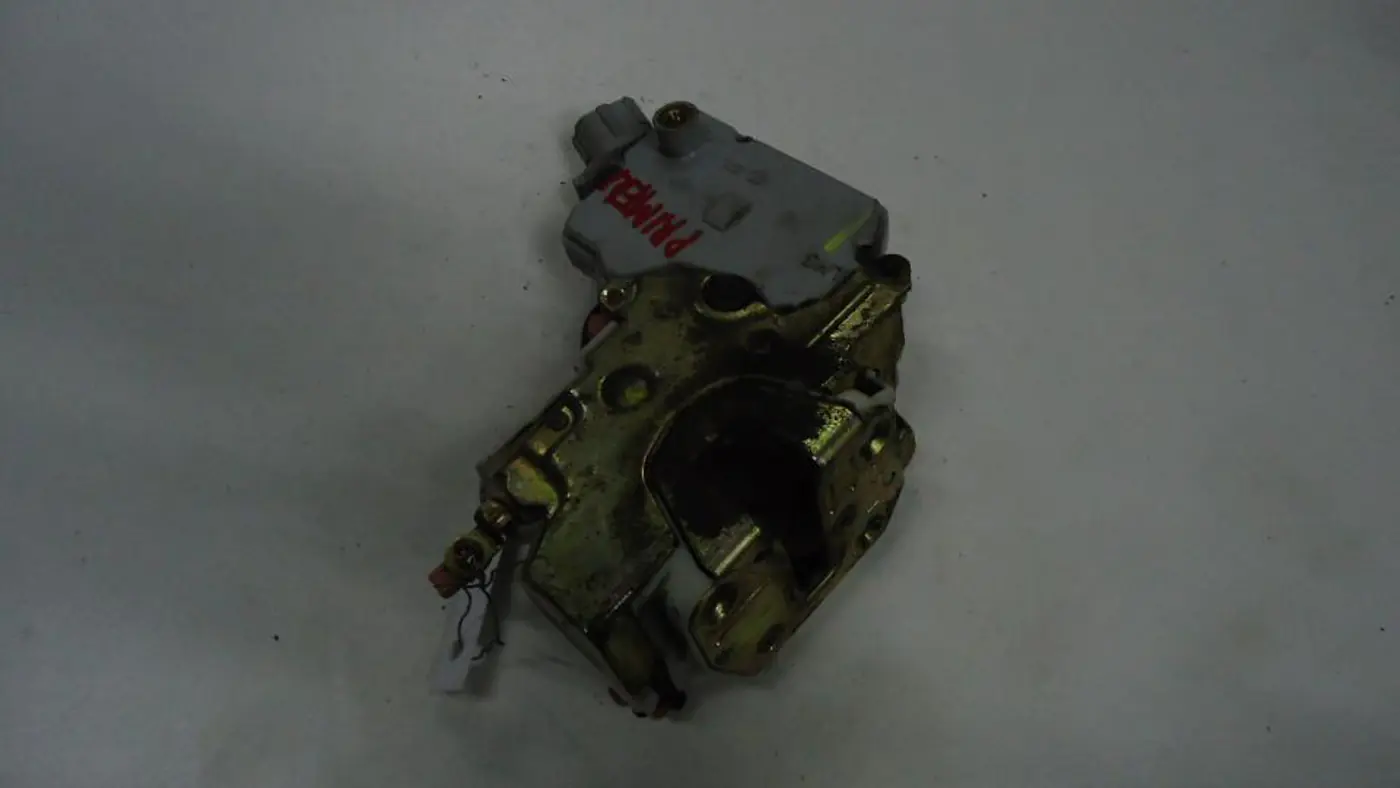 Замок двери передней левой к Nissan Primera 2000