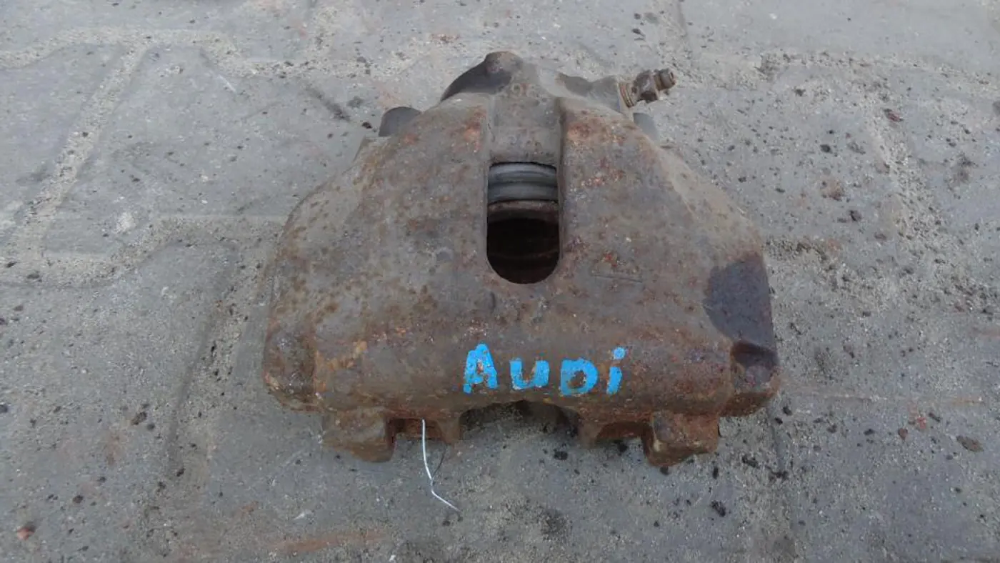Суппорт передний левый к Audi A6 1994