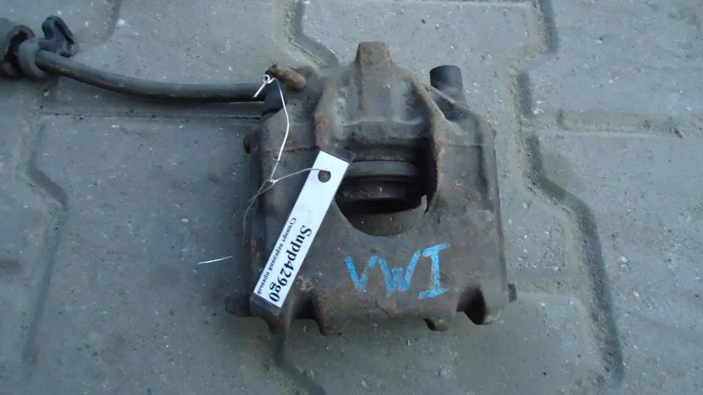 Суппорт передний правый к Volkswagen Golf 1980