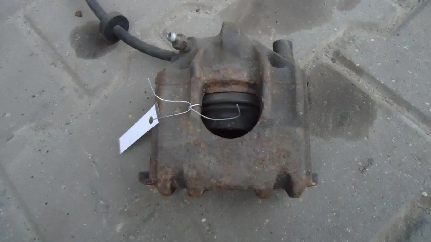 Суппорт передний правый к Volkswagen Polo 1998