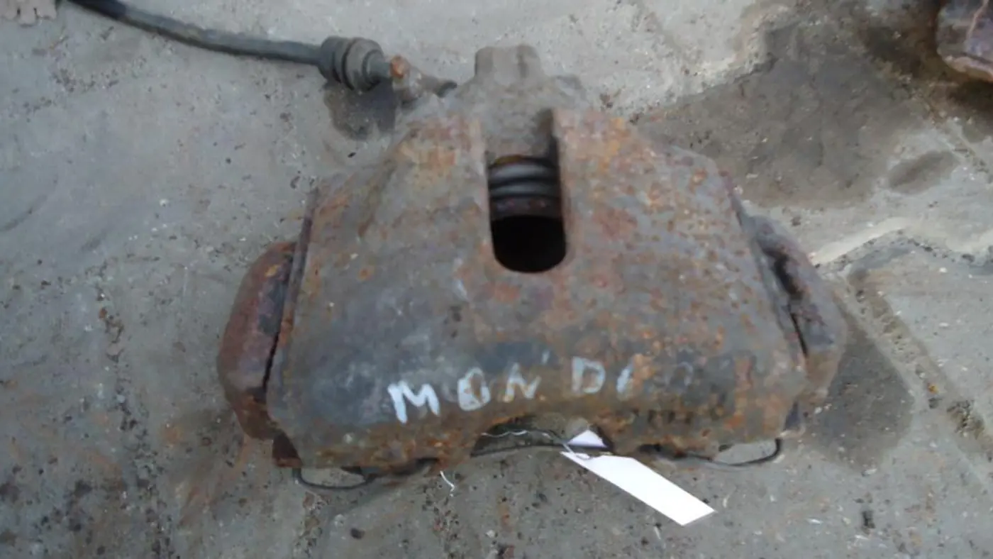 Суппорт передний правый к Ford Mondeo 1994