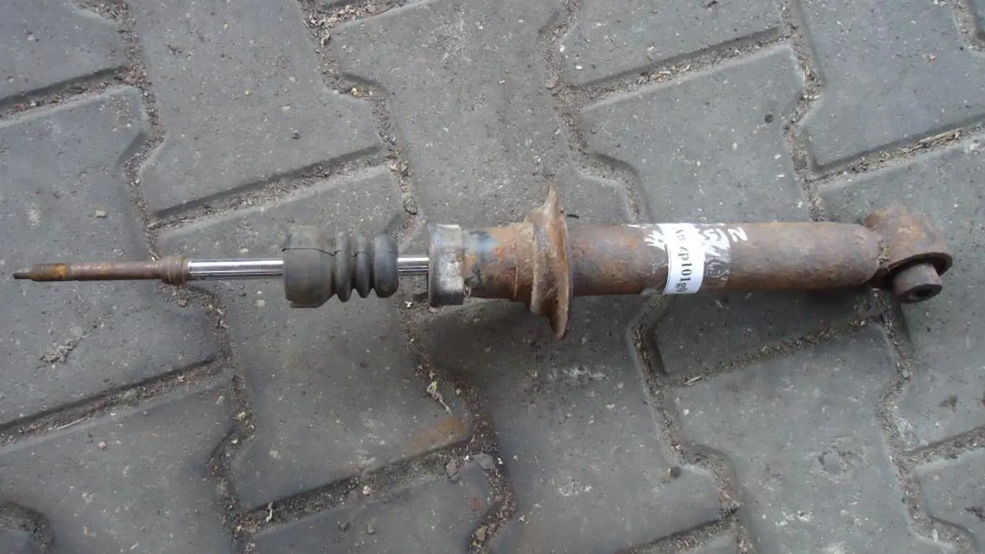 Амортизатор задний правый к Nissan Primera 1998