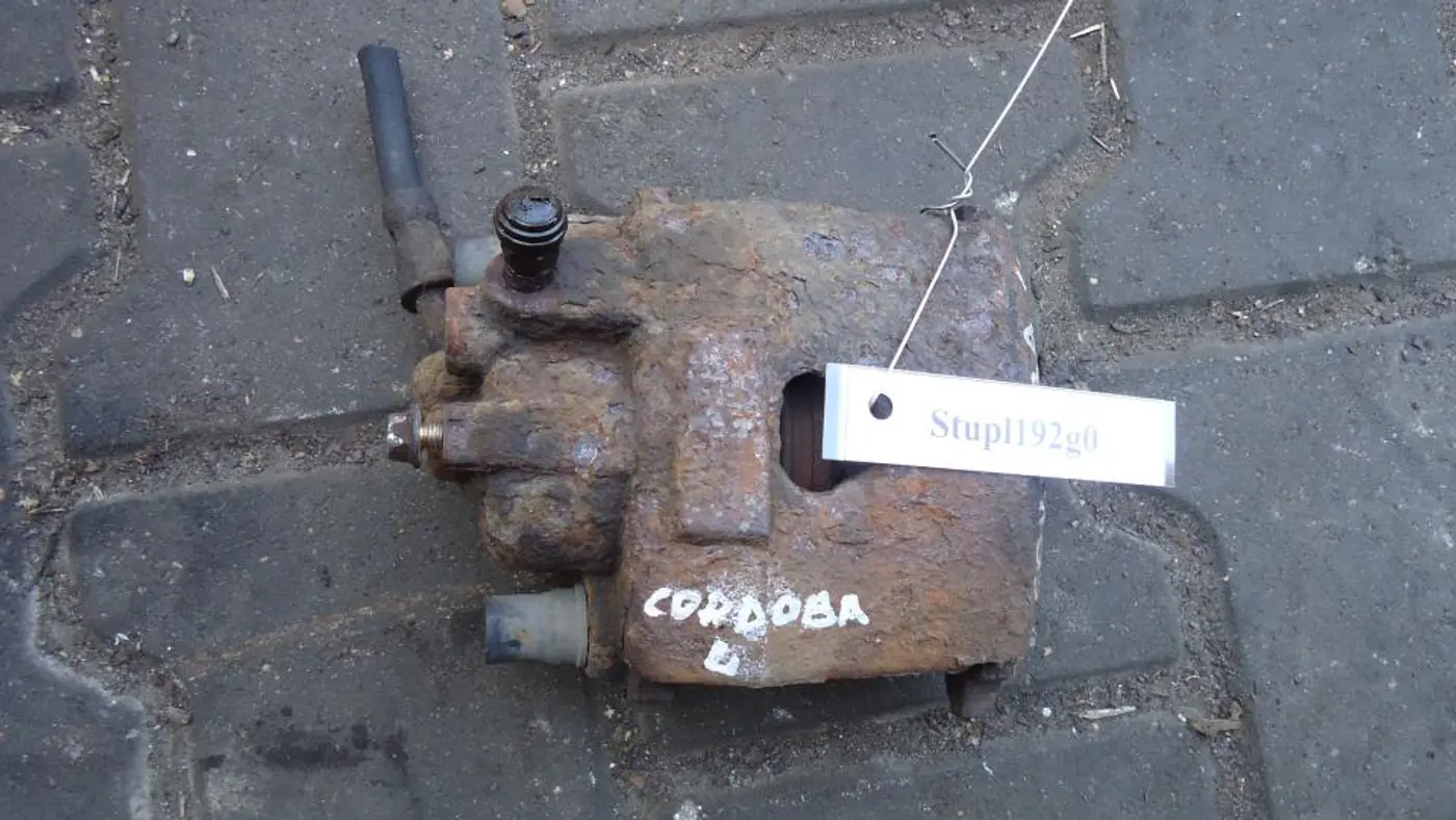 Суппорт передний левый к SEAT Cordoba 1998