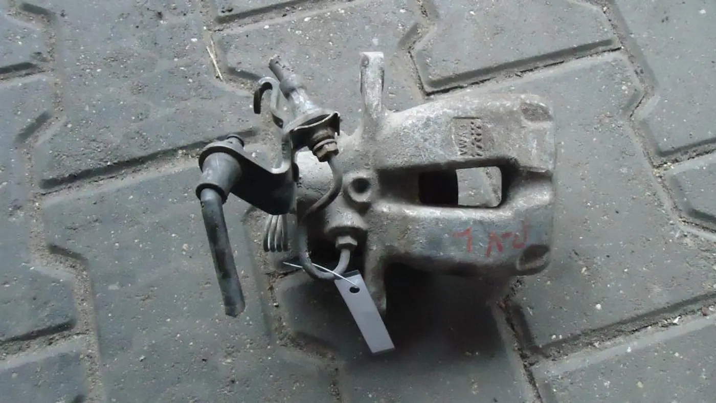 Суппорт задний левый к SEAT Altea 2008