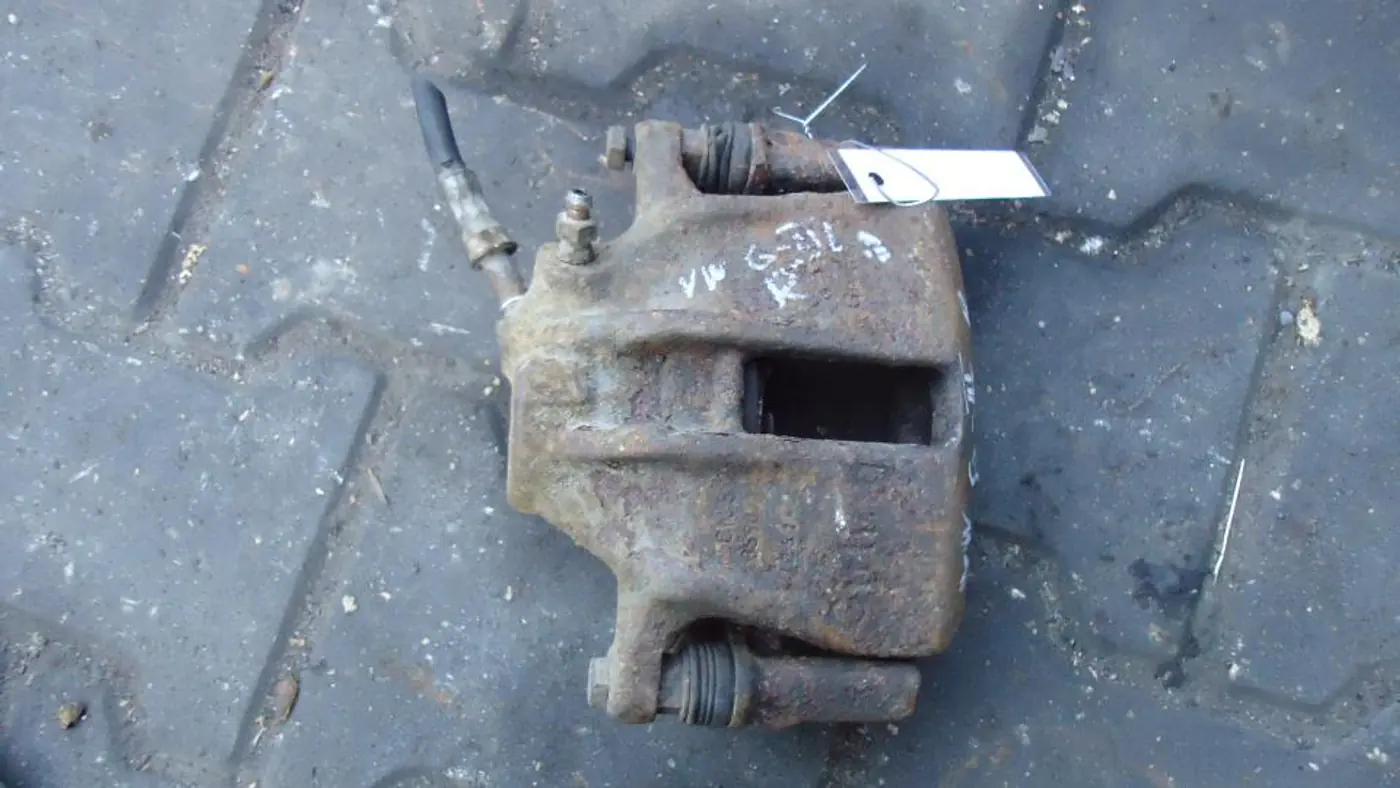 Суппорт передний правый к Volkswagen Golf 1995