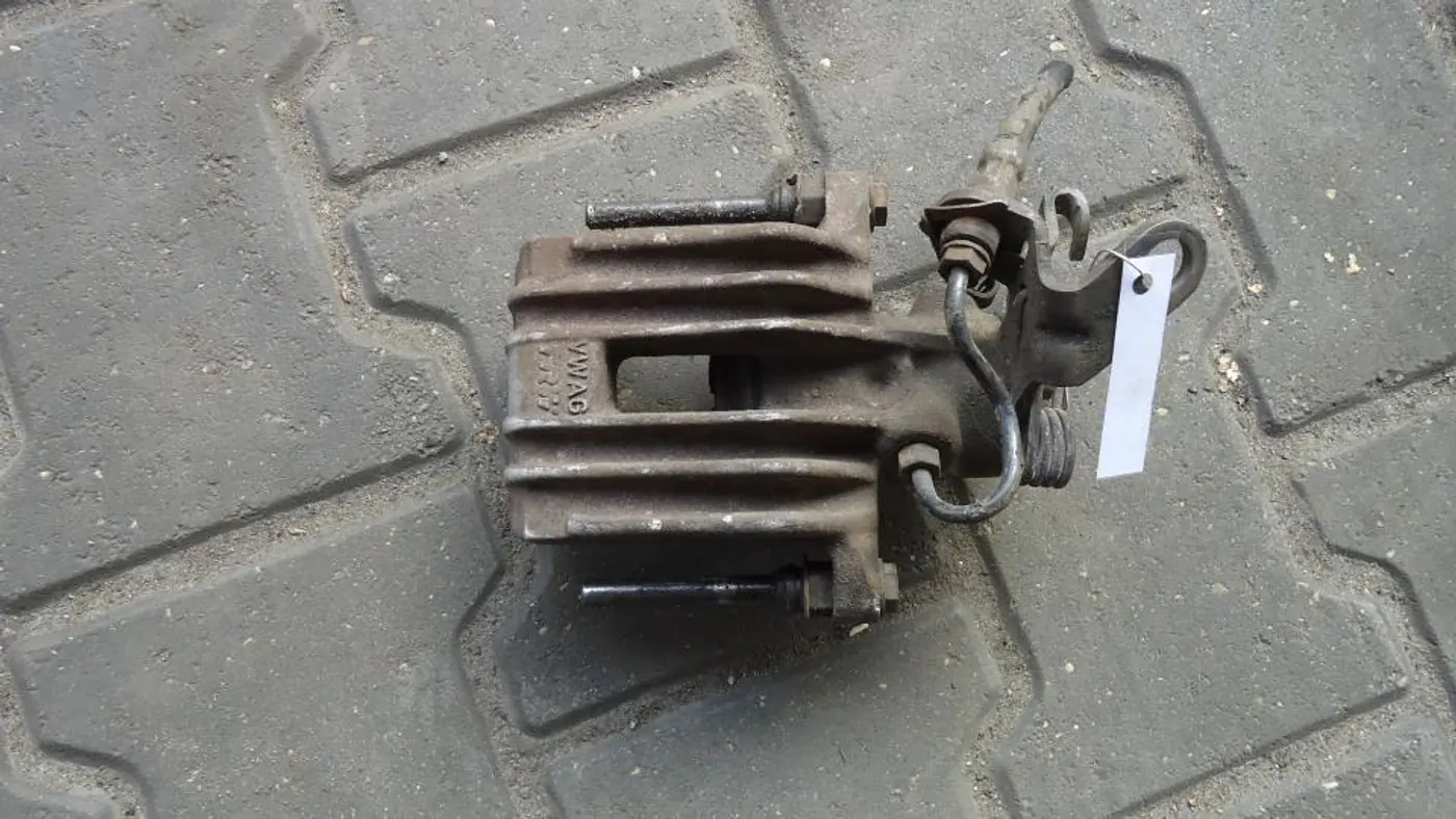 Суппорт задний правый к Skoda Octavia 2006