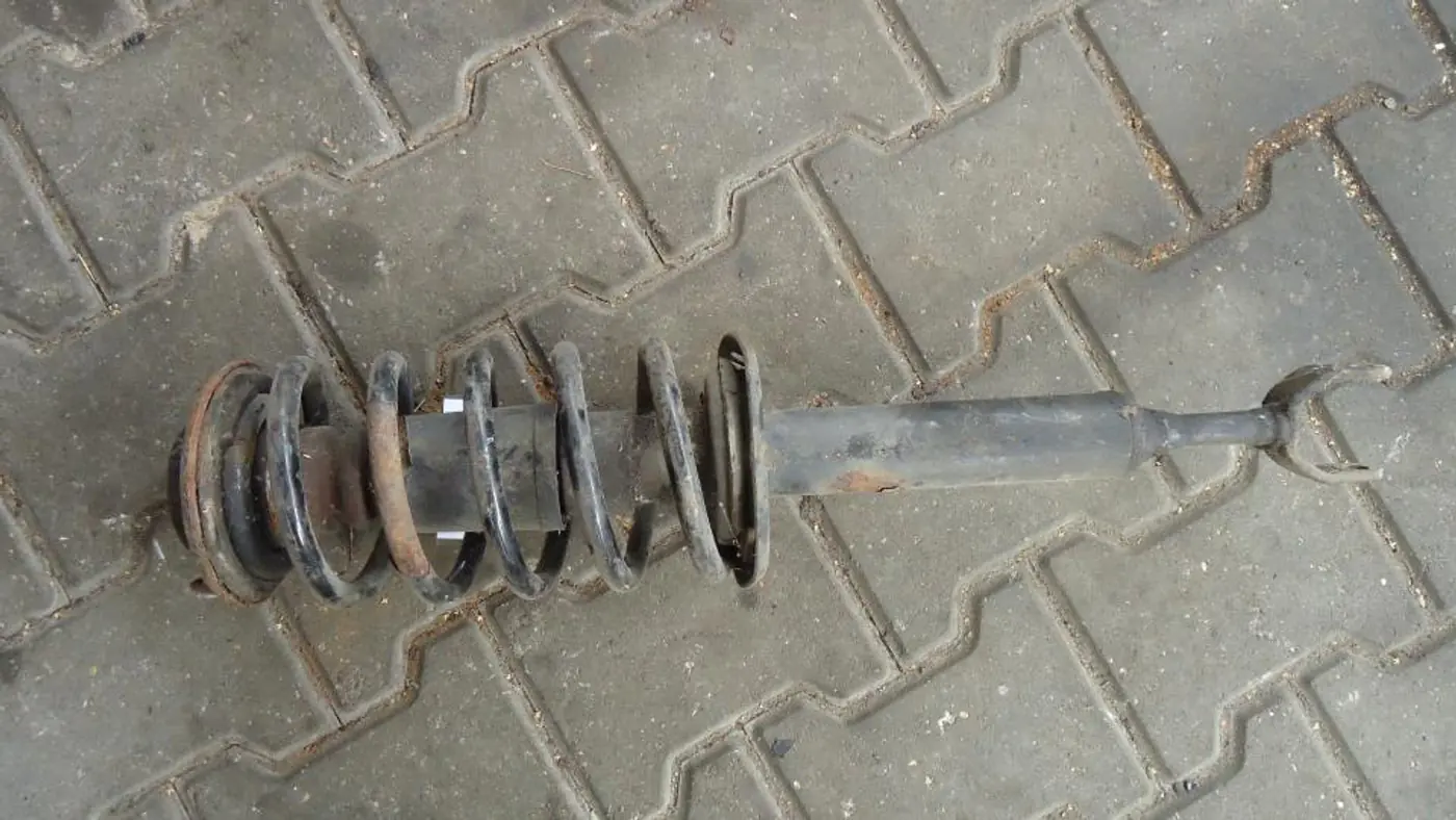 Стойка передняя левая к Audi A4 1998