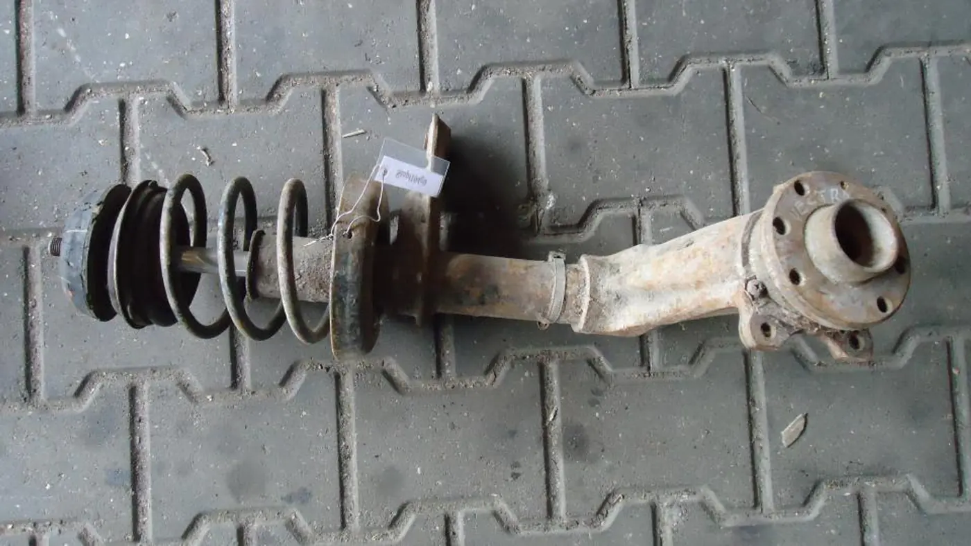 Стойка передняя левая к Opel Vectra 1991