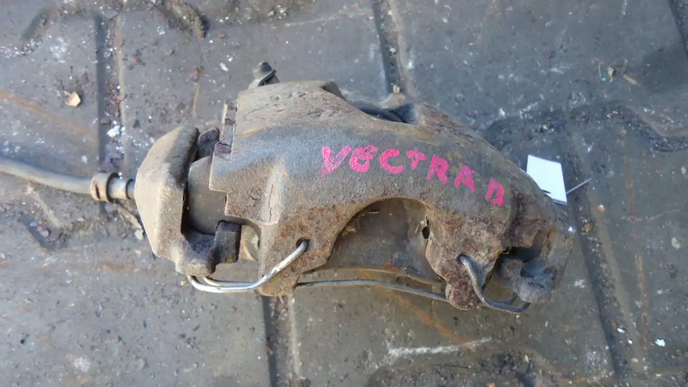 Суппорт передний правый к Opel Vectra 1996