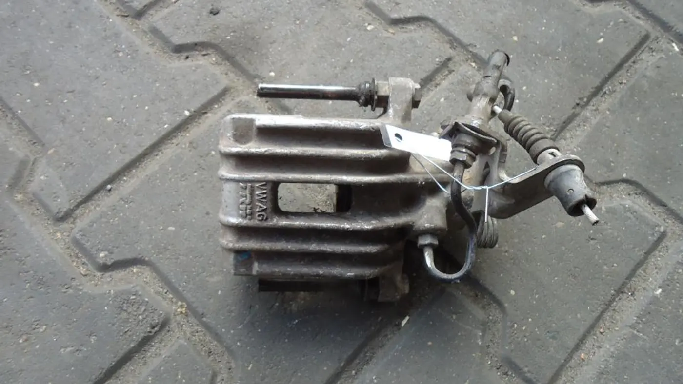 Суппорт задний правый к Volkswagen Golf 2006