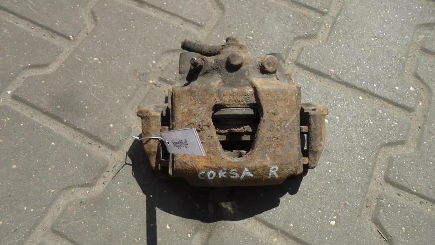 Суппорт передний правый к Opel Corsa 1998