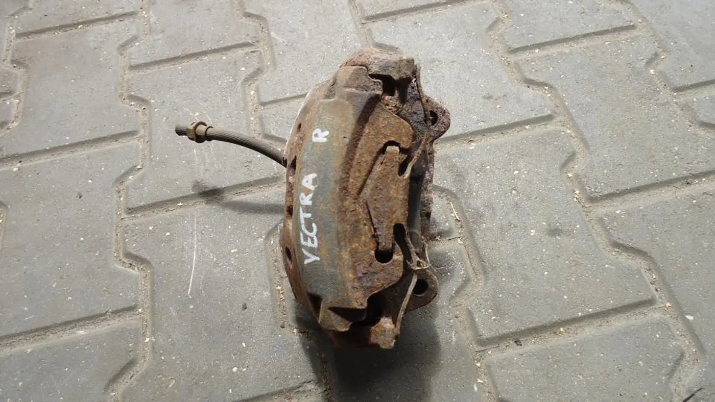 Суппорт передний правый к Opel Vectra 2003