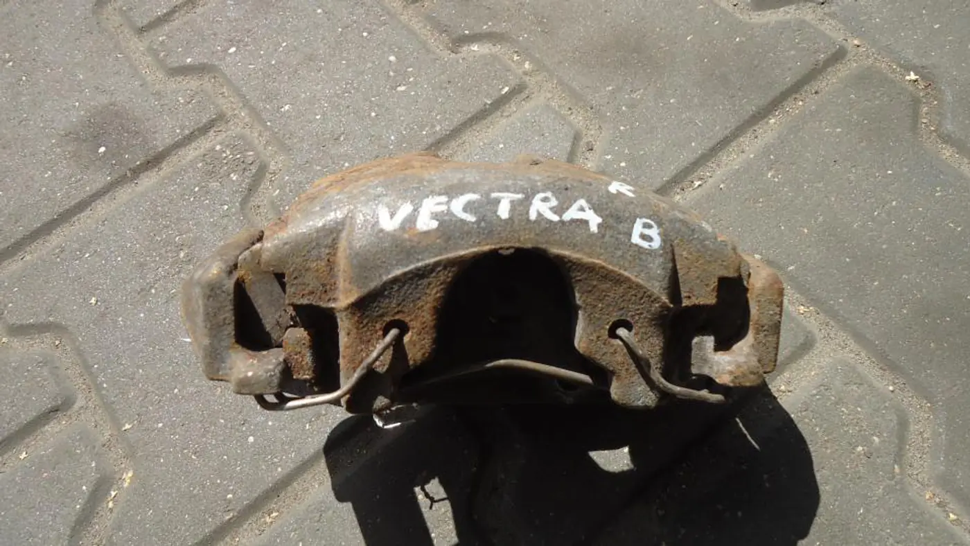 Суппорт передний правый к Opel Vectra 1998