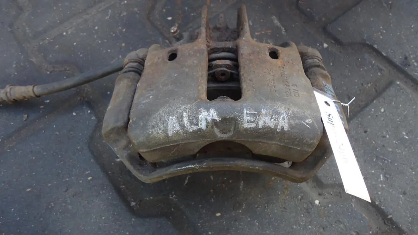 Суппорт передний правый к Nissan Almera 1998