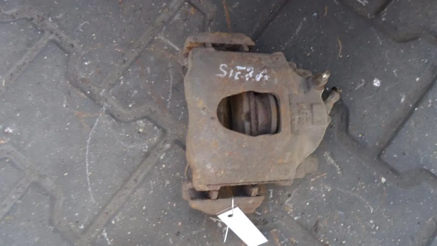 Суппорт передний правый к Ford Sierra 1988
