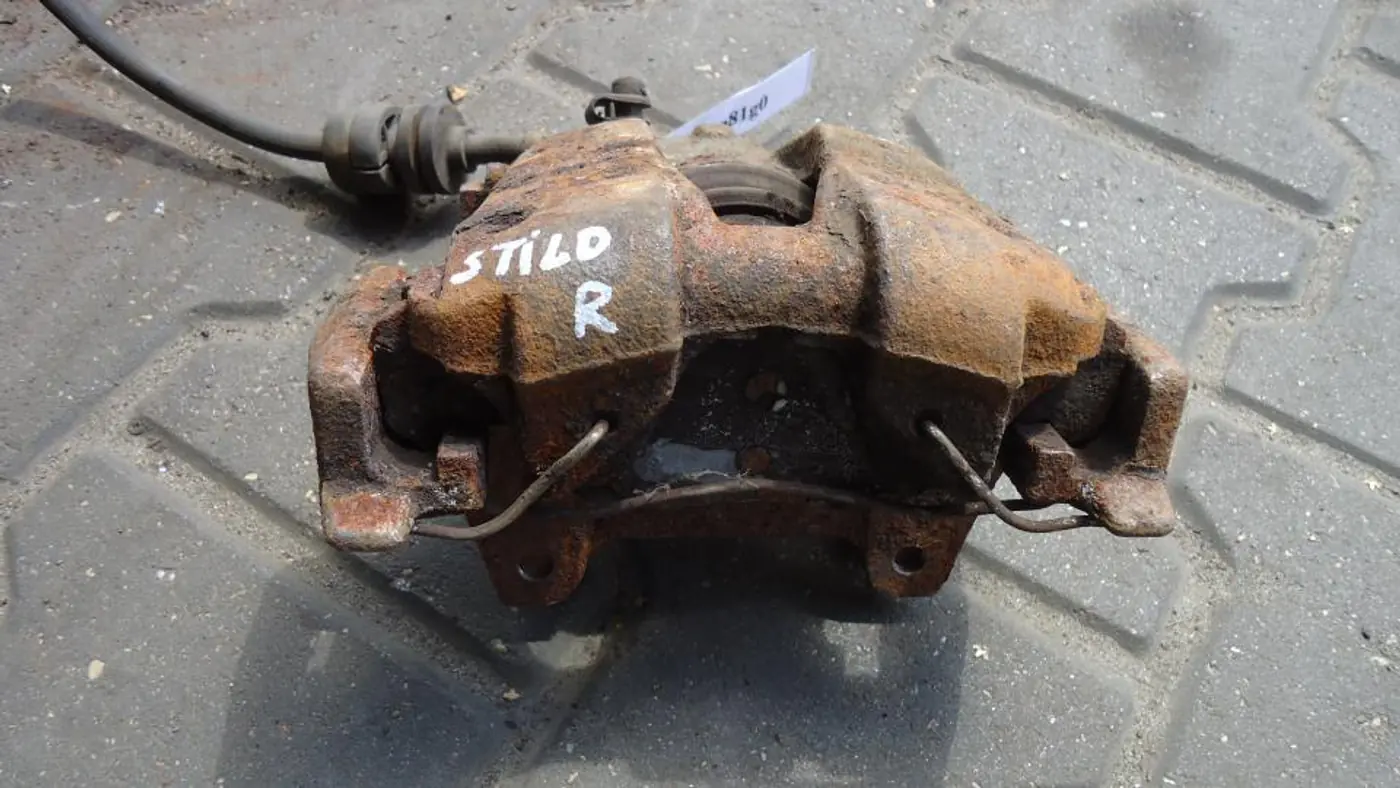 Суппорт передний правый к Fiat Stilo 2001