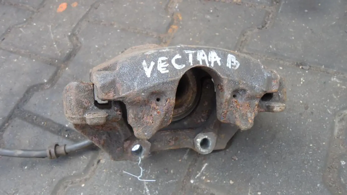 Суппорт передний правый к Opel Vectra 1997