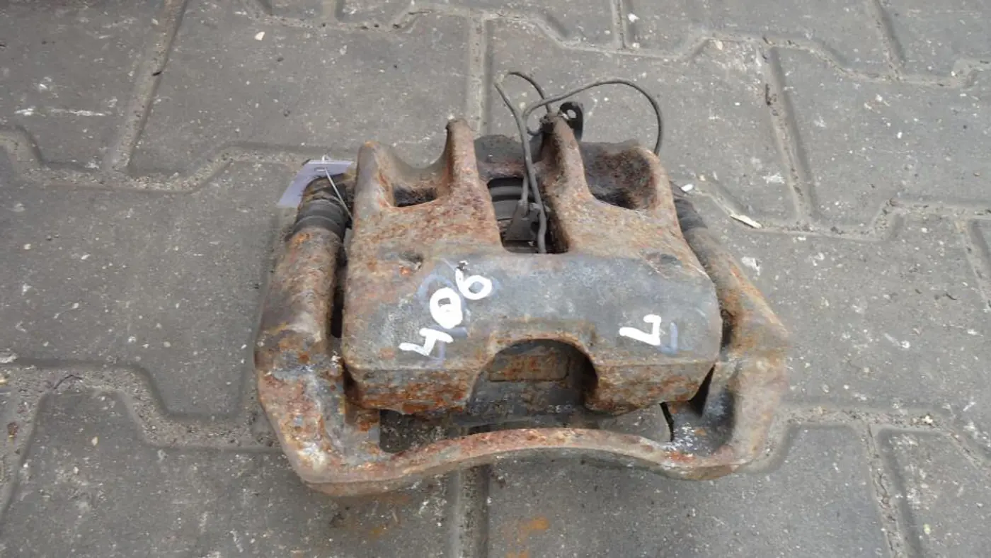 Суппорт передний левый к Peugeot 406 1998