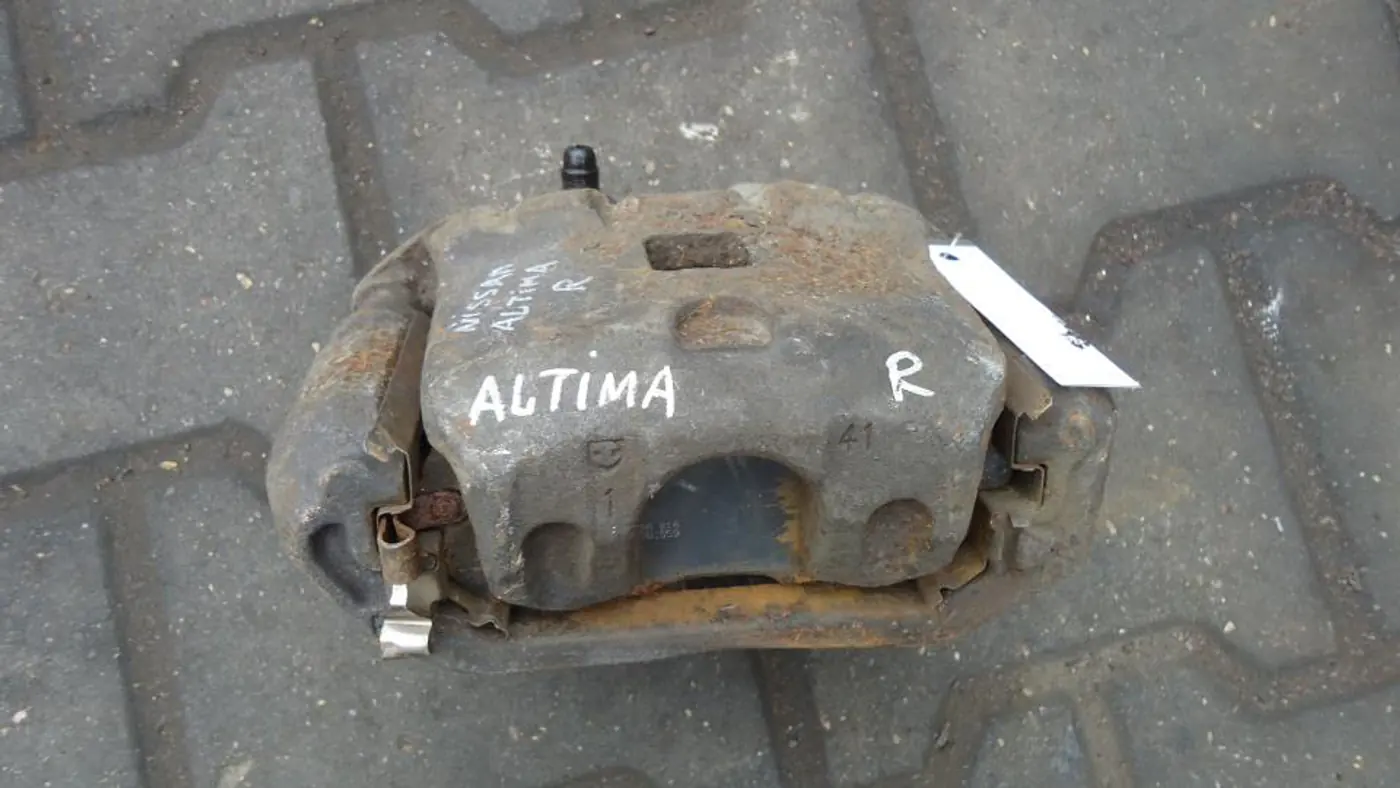 Суппорт передний правый к Nissan Altima 2002