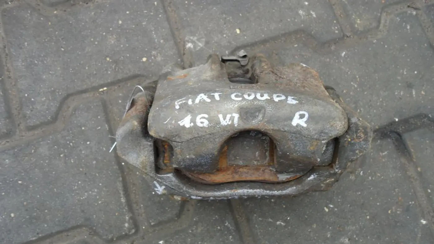 Суппорт передний правый к Fiat Coupe 1997