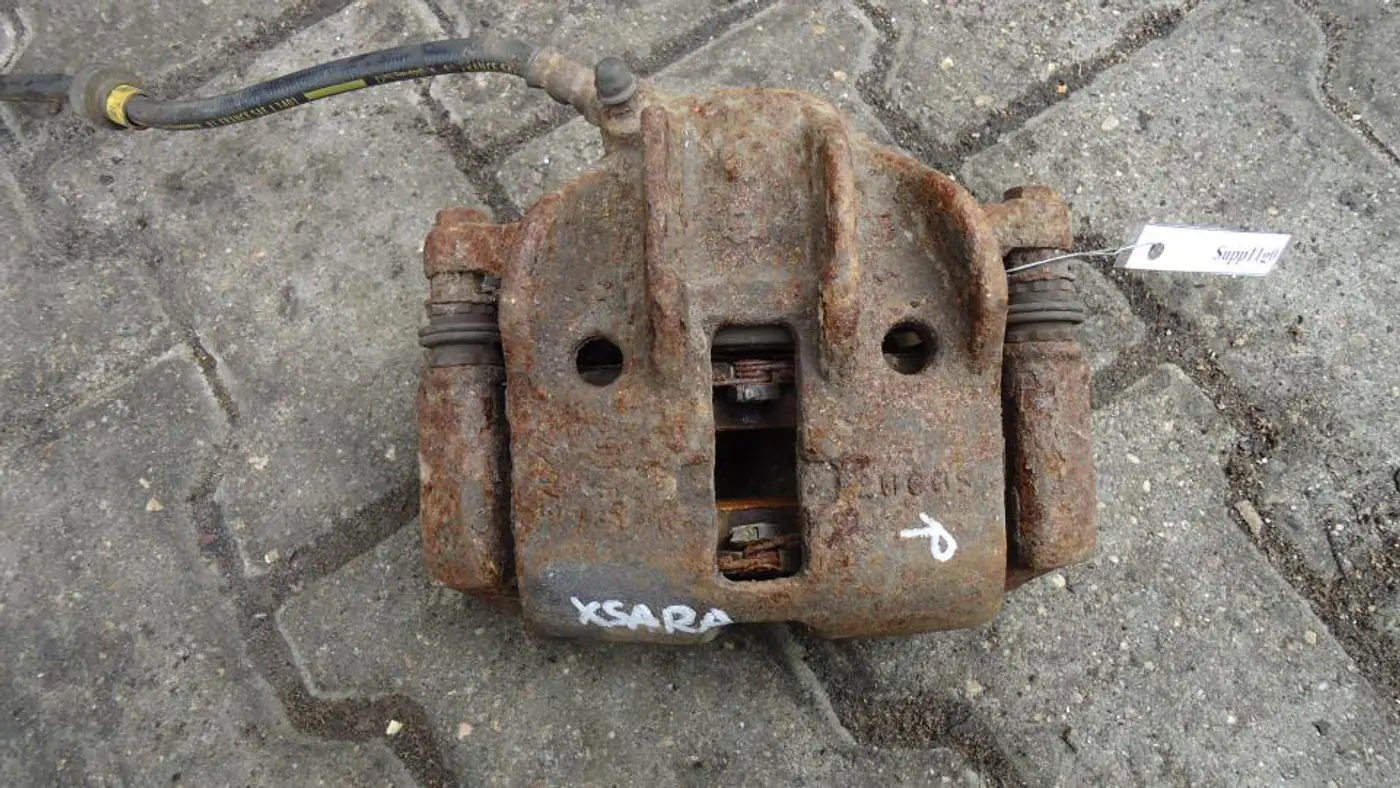 Суппорт передний правый к Citroen Xsara 1998