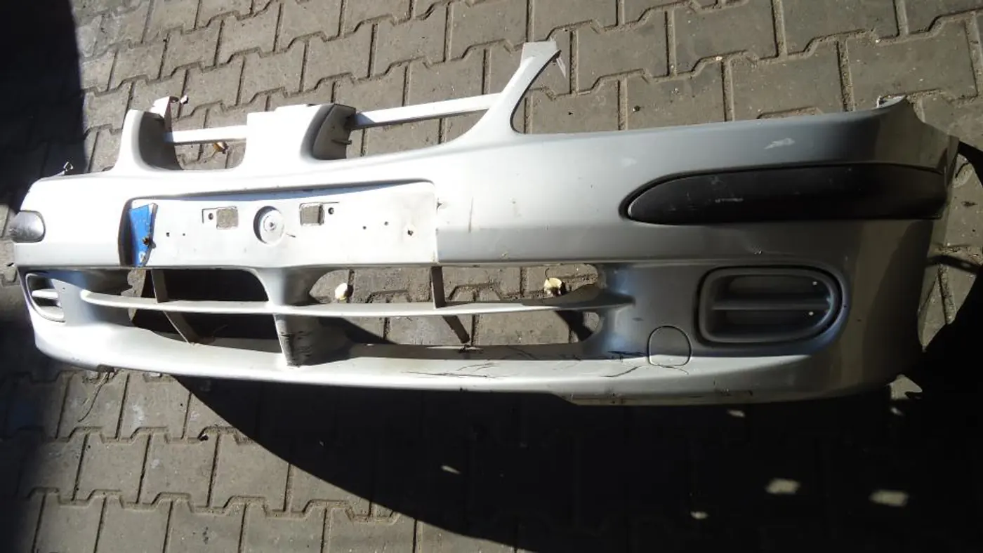 Бампер передний к Nissan Almera 2001