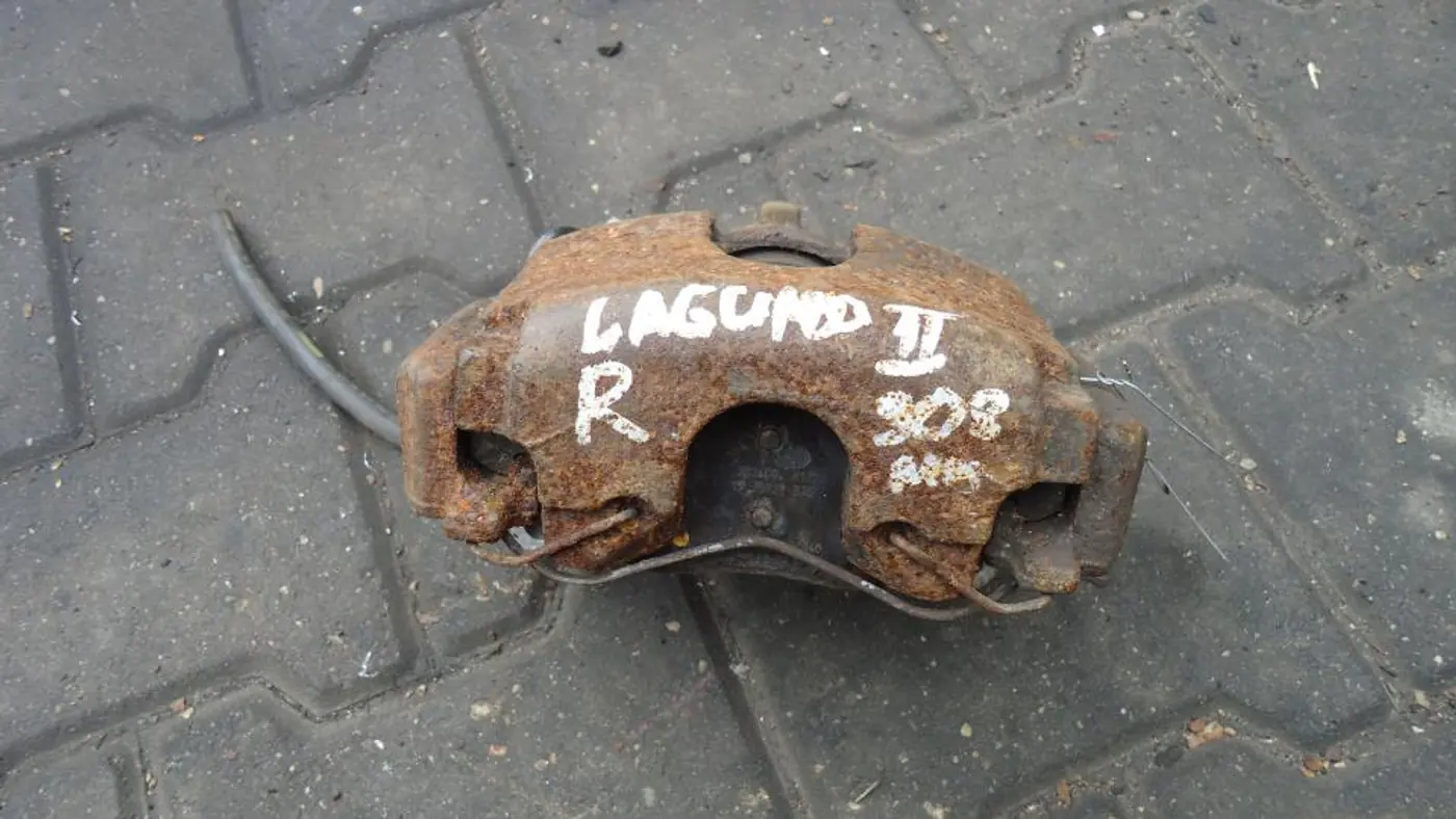 Суппорт передний правый к Renault Laguna 2003