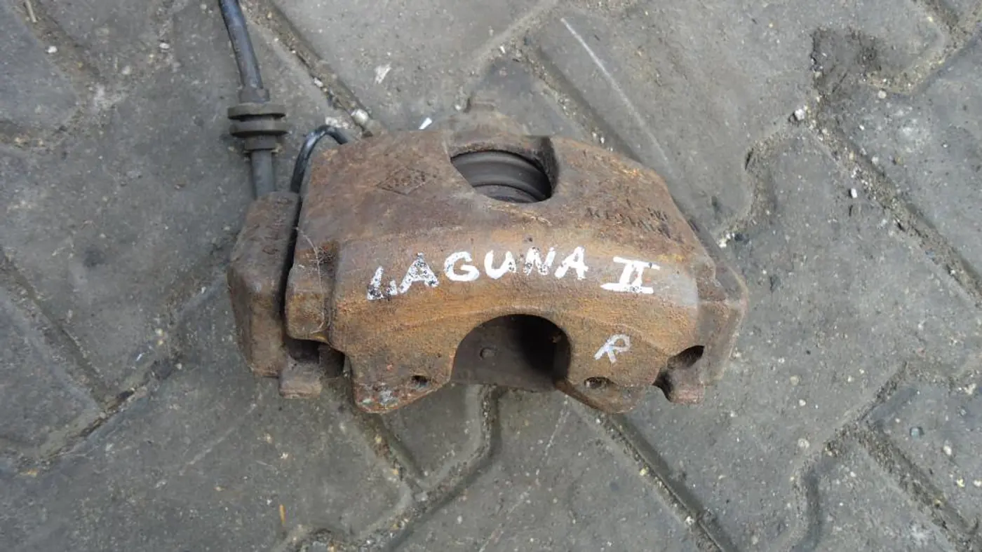 Суппорт передний правый к Renault Laguna 2003