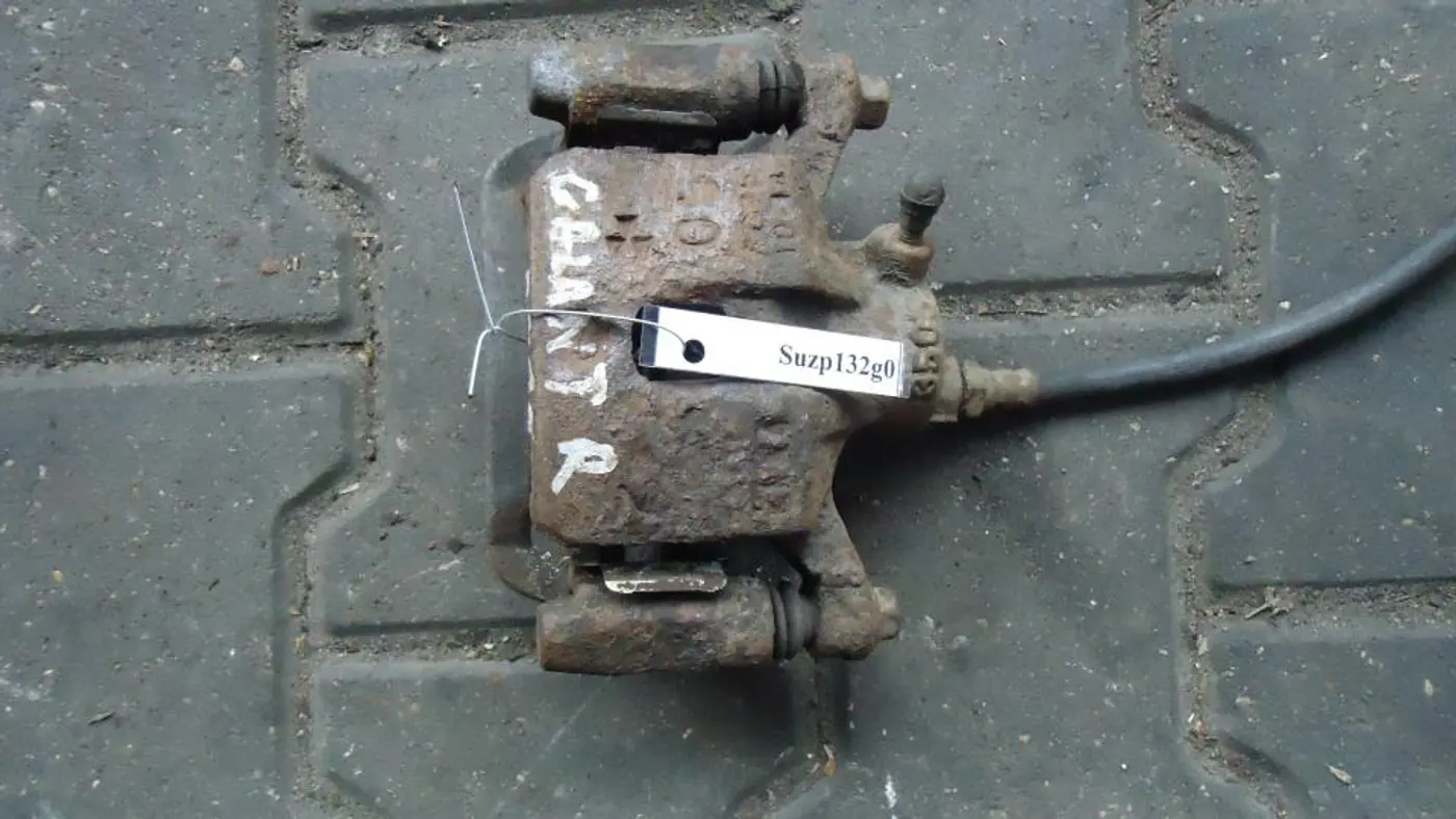 Суппорт задний правый к Mitsubishi Galant 1998