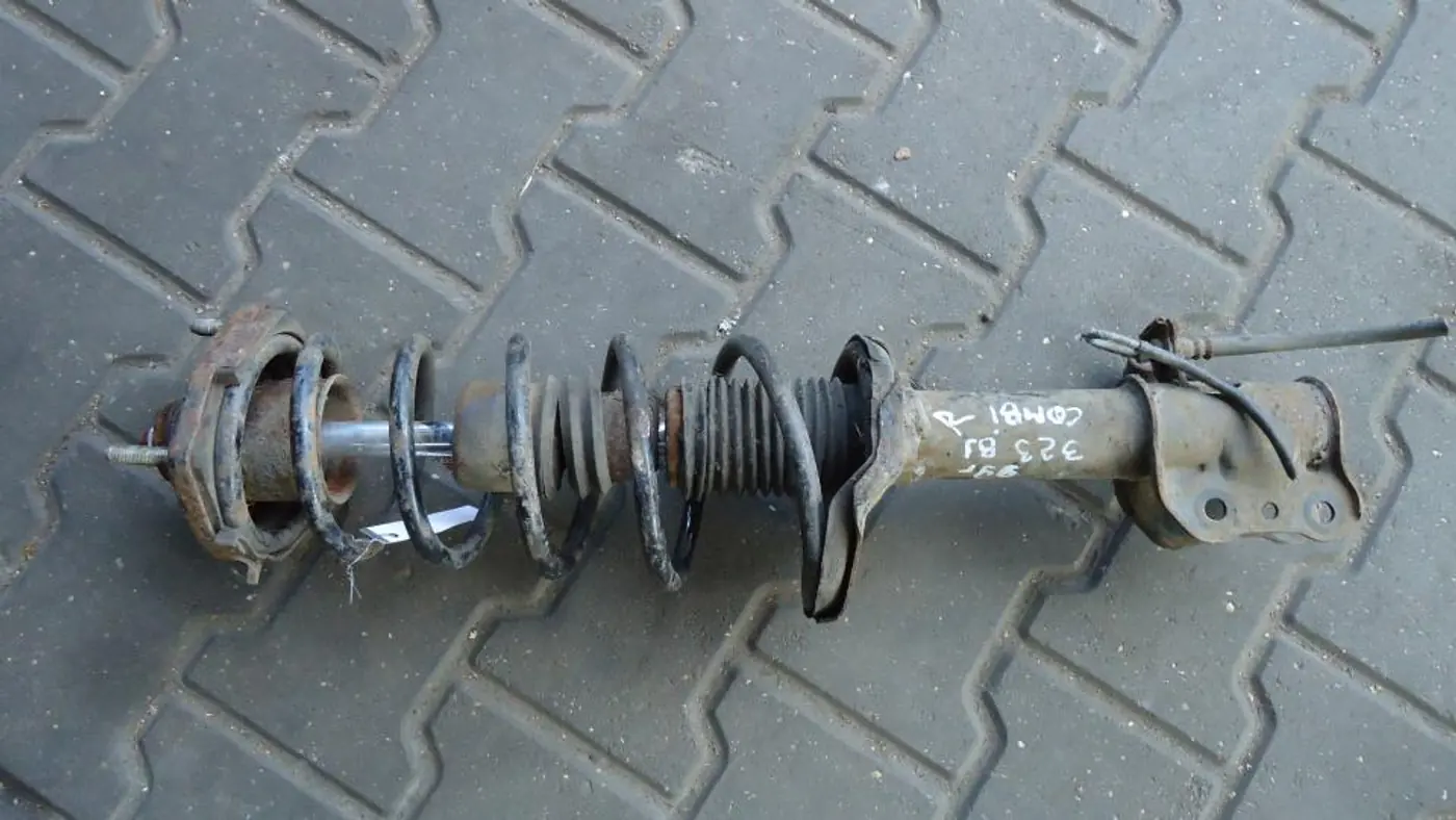 Стойка задняя к Mazda 323 1999