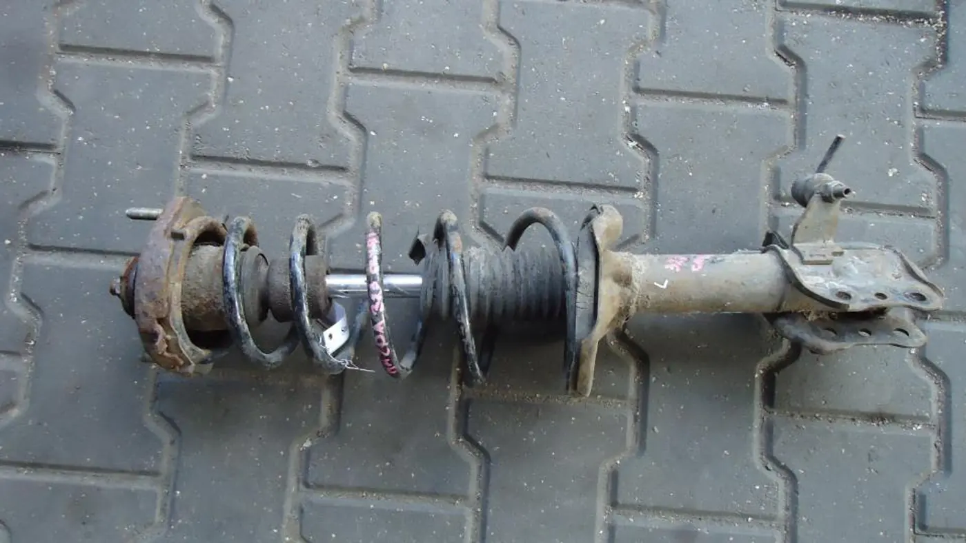 Стойка задняя к Mazda 323 1999