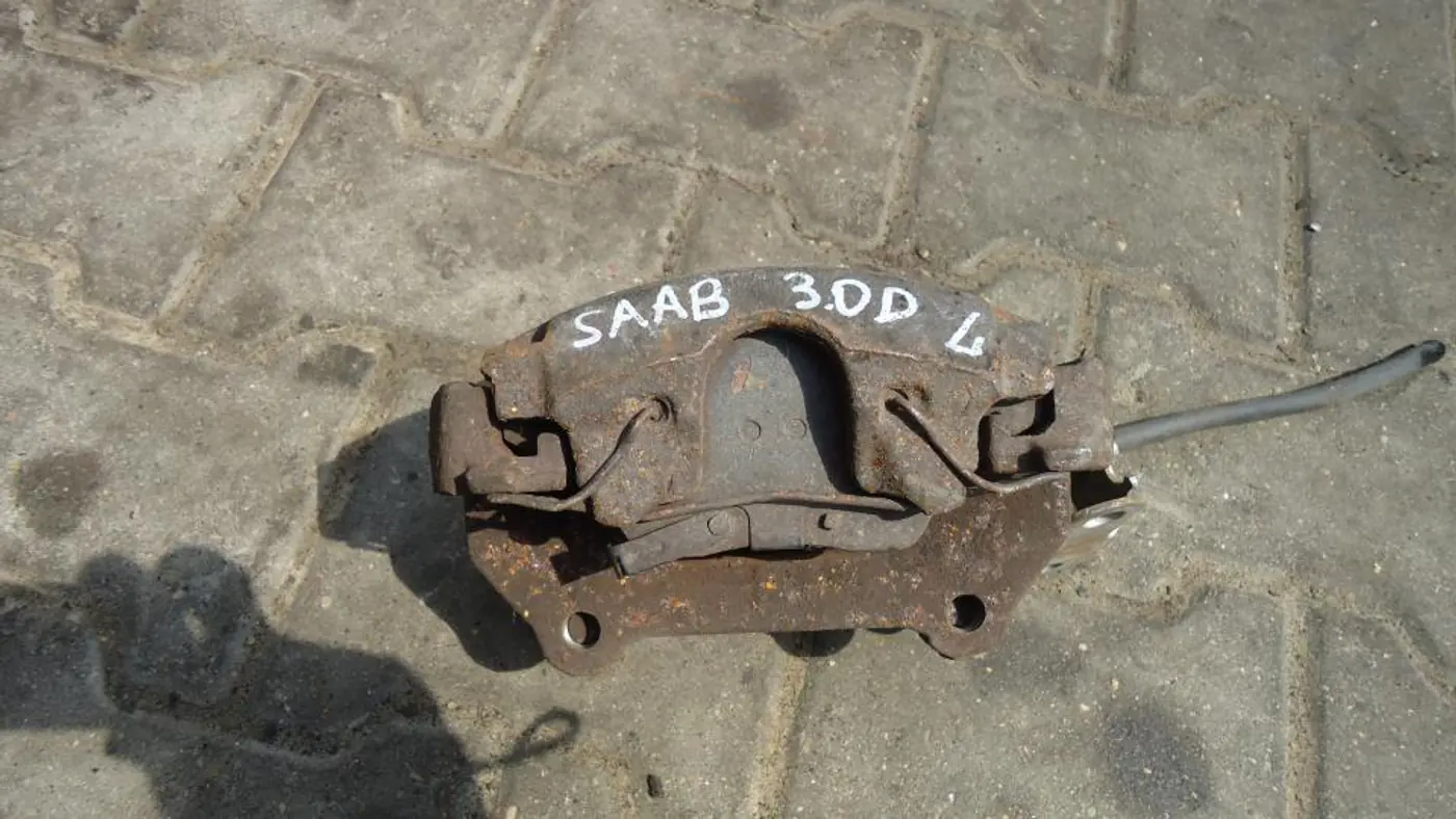 Суппорт передний левый к Saab 9-5 2003