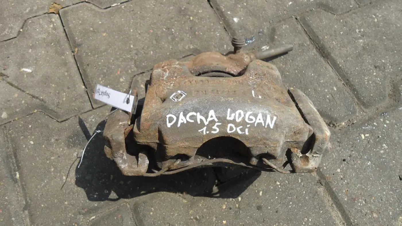 Суппорт передний левый к Dacia Logan 2006