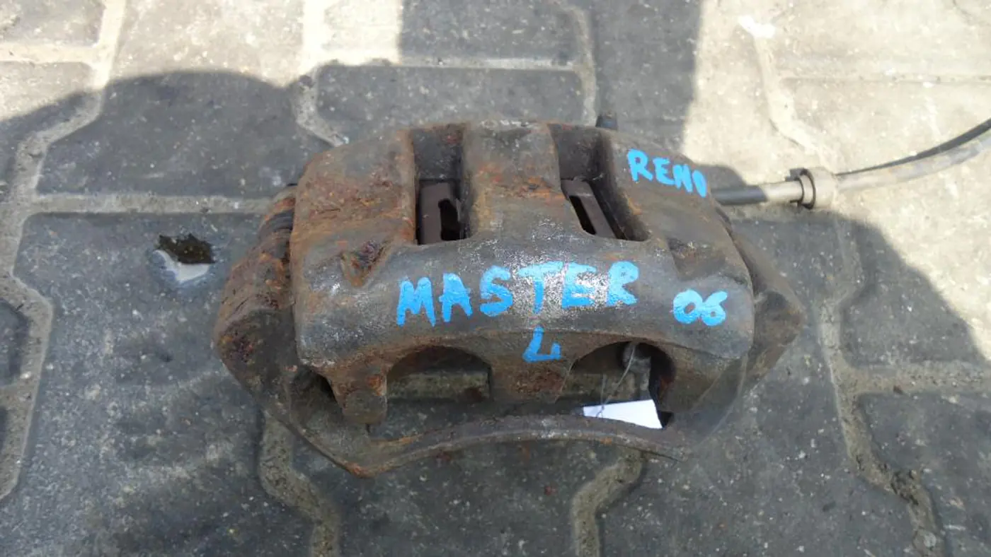 Суппорт передний левый к Renault Master 2006