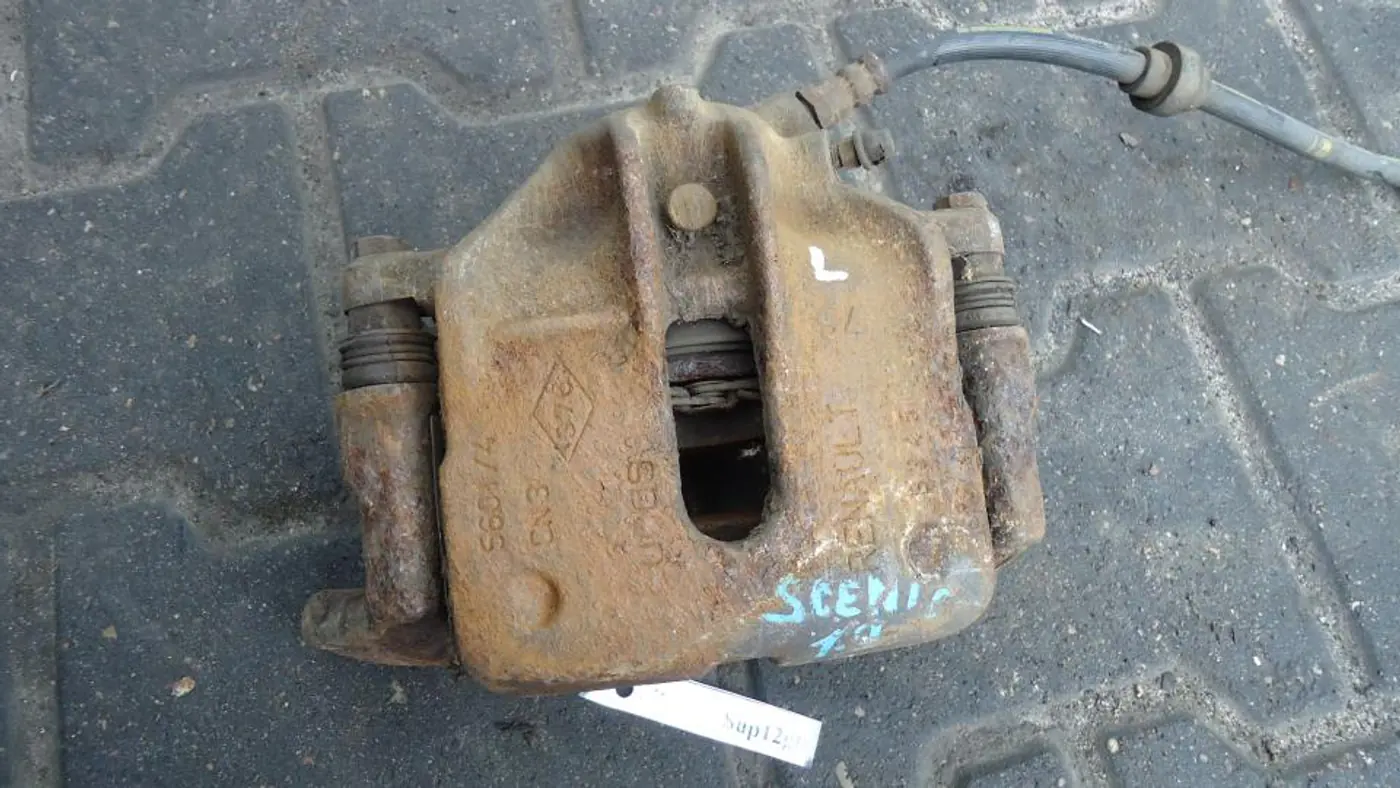 Суппорт передний левый к Renault Scenic 1999