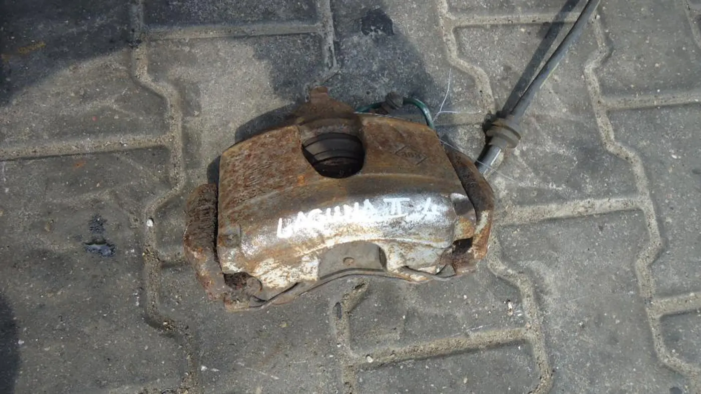 Суппорт передний левый к Renault Laguna 2003