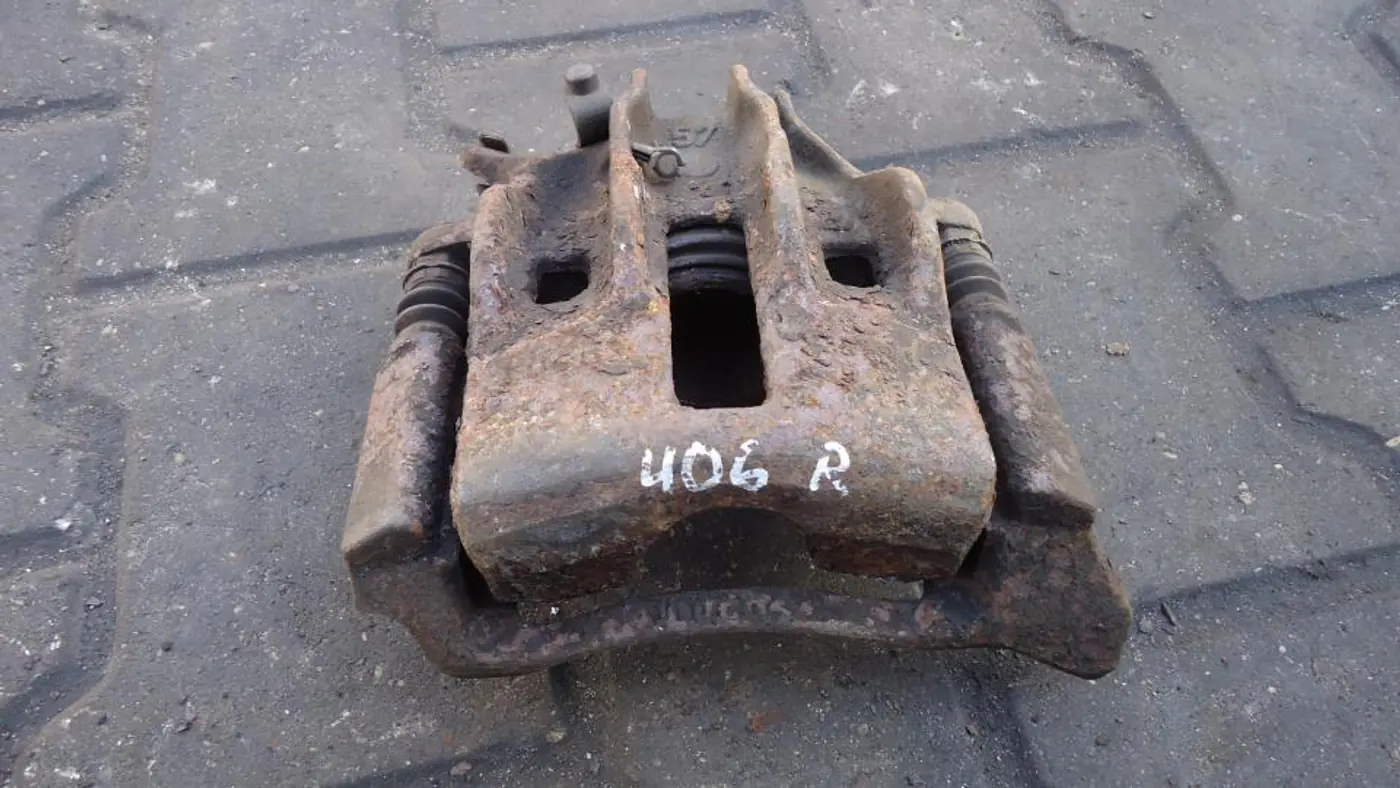 Суппорт передний правый к Peugeot 406 1998