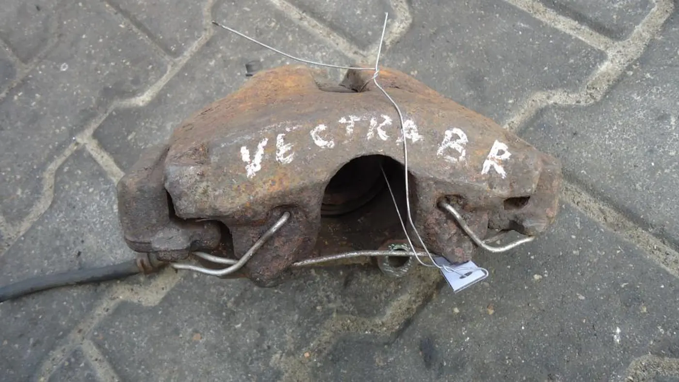 Суппорт передний правый к Opel Vectra 1997