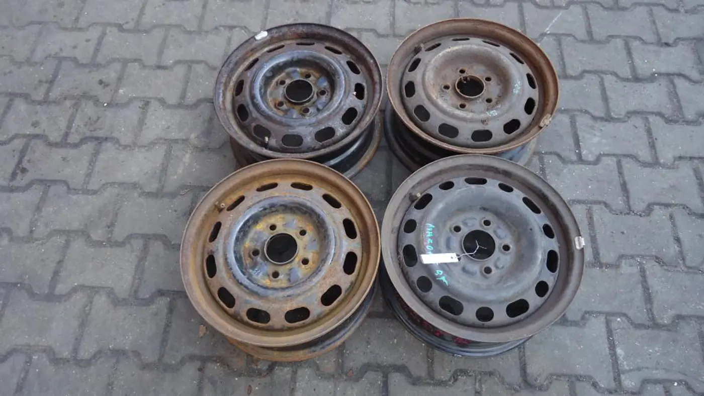 Диск штампованный к Mazda 323 1995