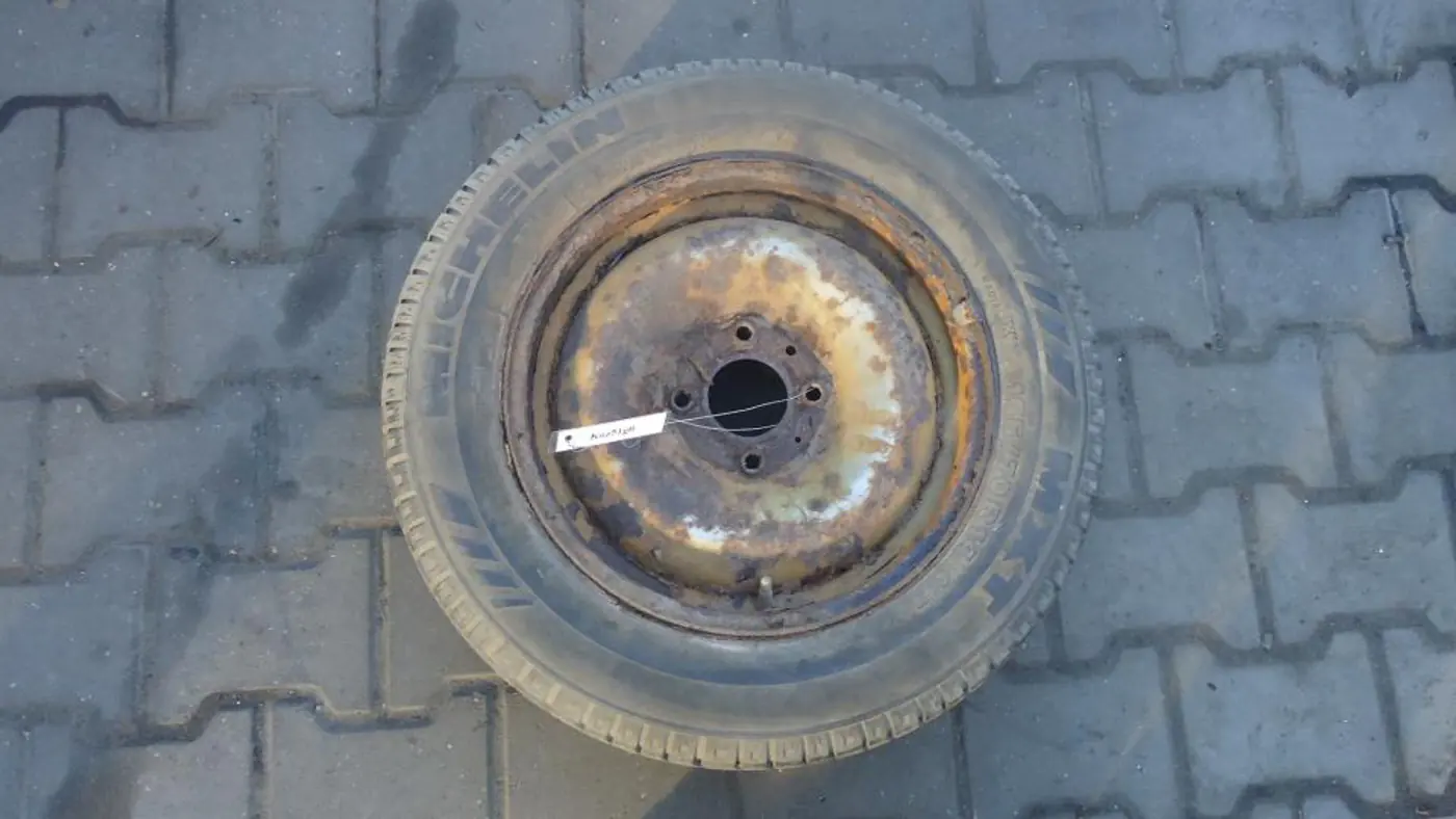 Колесо запасное (таблетка) к Peugeot 306 1997