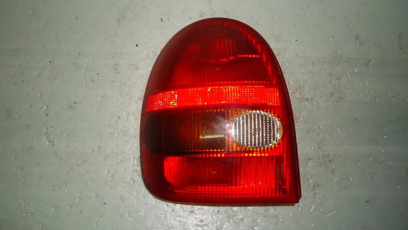 Фонарь задний левый к Opel Corsa 1995
