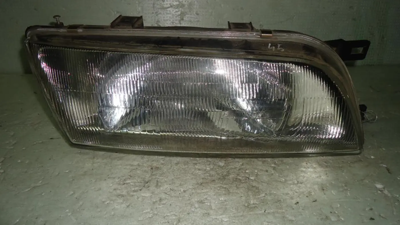 Фара правая к Nissan Almera 1997