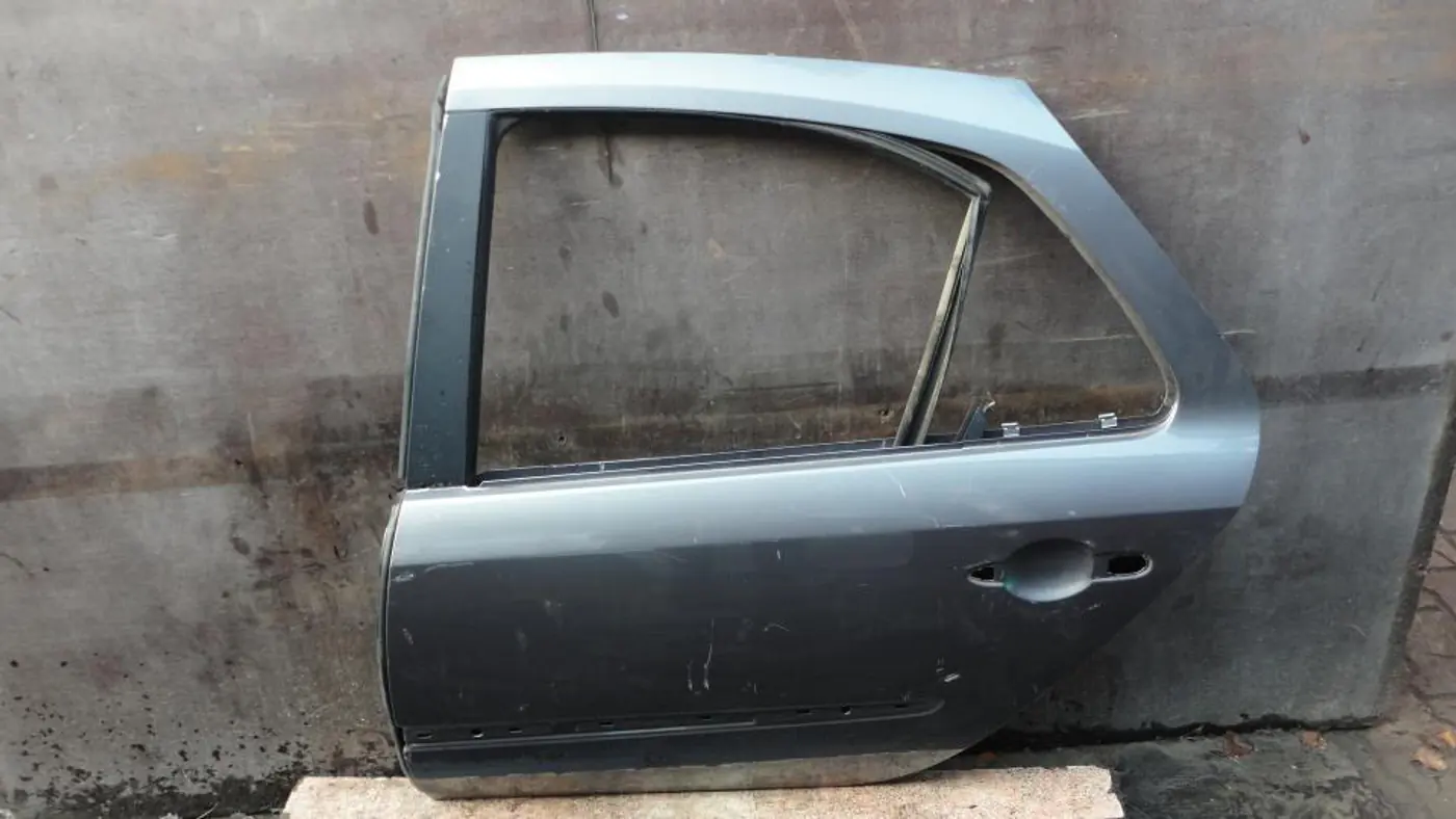 Дверь задняя левая к Renault Laguna 2001