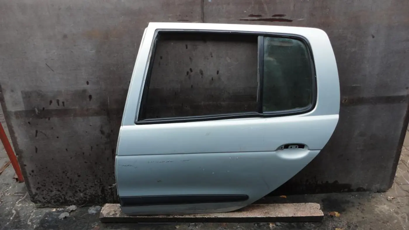 Дверь задняя левая к Renault Megane 1999