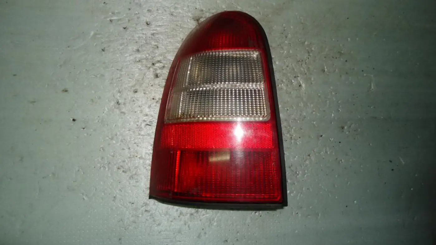 Фонарь задний левый к Opel Vectra 1996