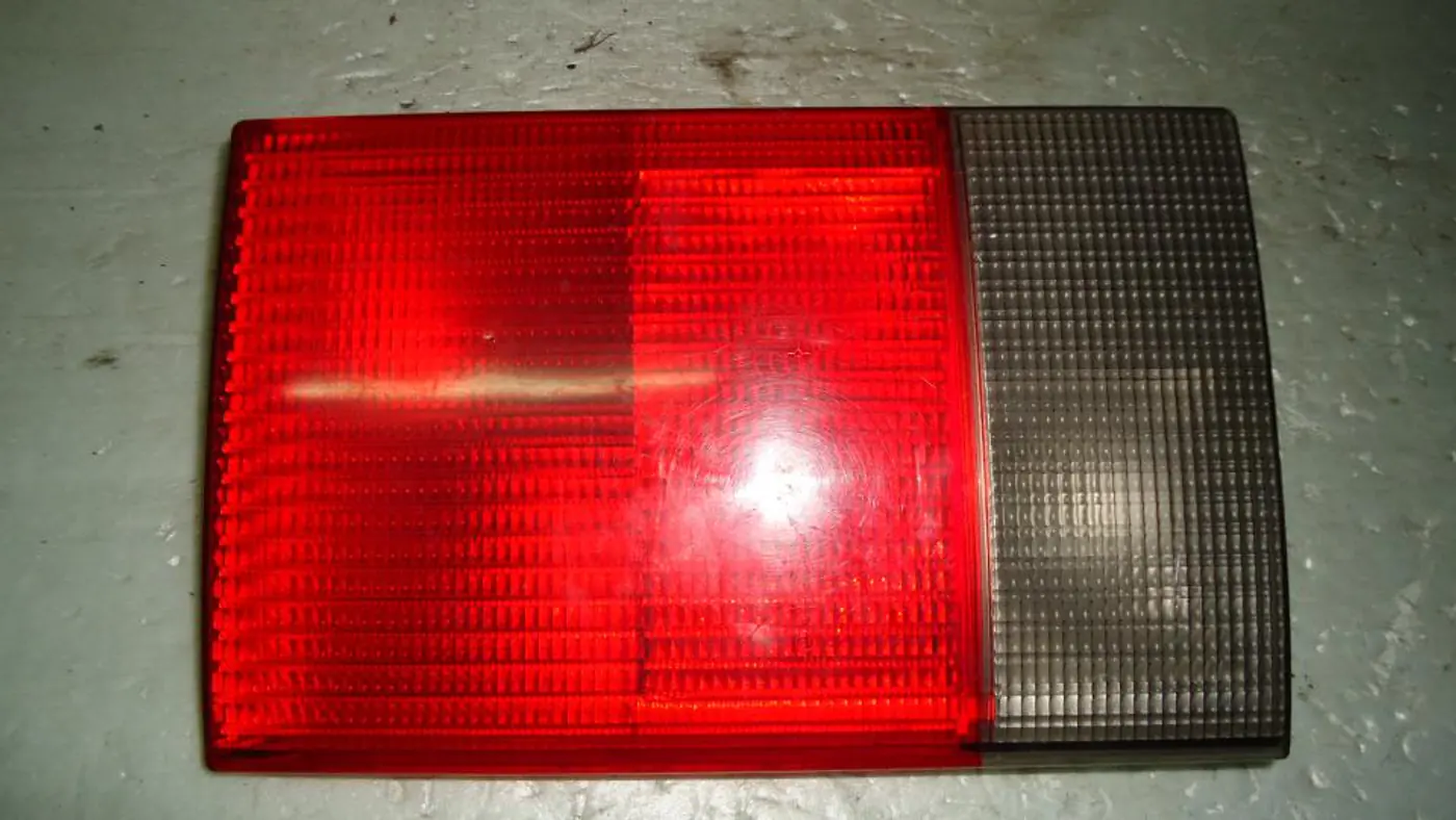 Фонарь крышки багажника левый к Audi 100 1992